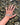 Hand in water with Wool Bandage on top of hand
