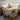 Set of wool dryer balls in a wooden bowl on rustic table