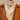 White wool scarf under a leather jacket around the neck of a mannequin
