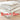 Wool bedding stacked with red Barn Bin lettering over top